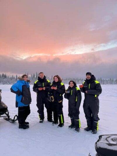 Guided Snowmobile Tour and Swedish Fika Experience
