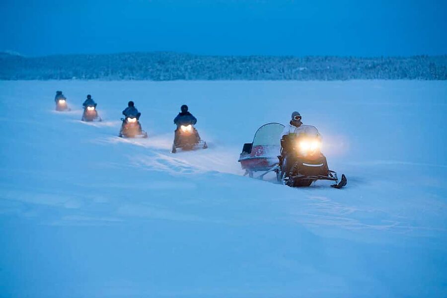 Kiruna: Northern Lights Snowmobile Tour with Transfer - Pickup and winter gear: where the night actually starts