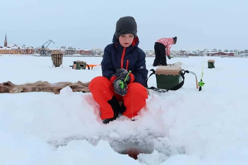 Lulea: Ice Fishing Tour in the heart of the city with Guide - First step: Gamla Hamnkranen, your ice-fishing starting line