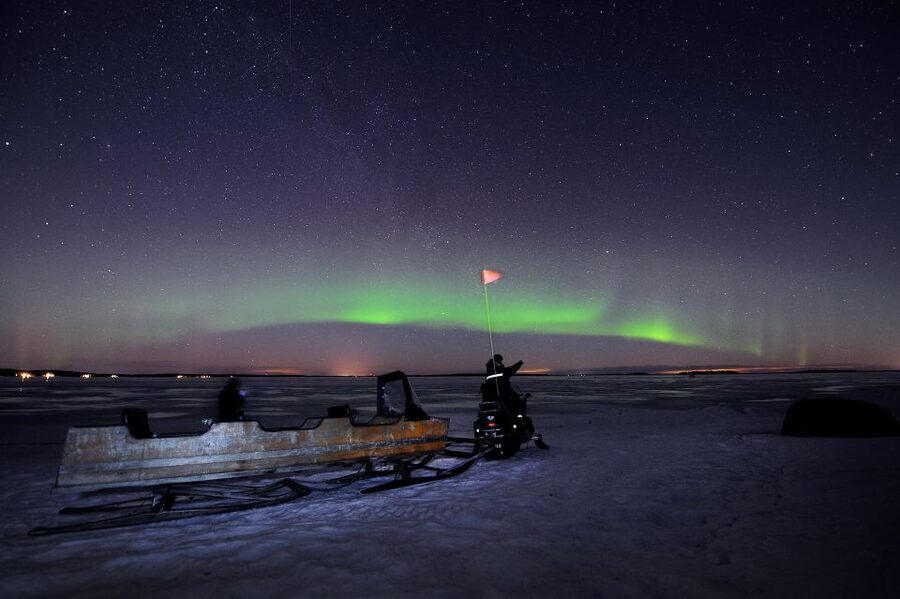 Luleå : Northern Lights Tour on a Snowmobile drawn Sled - Comfort in the Cold: Reindeer Pelts, Blankets, and Provided Gear