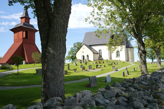 Private Tour: Swedish History Day Trip to World Heritage Candidate Markim-Orkesta from Stockholm - Orkesta kyrka and the local graveyard feel: runestones, Romanesque shape, and Medieval frescoes
