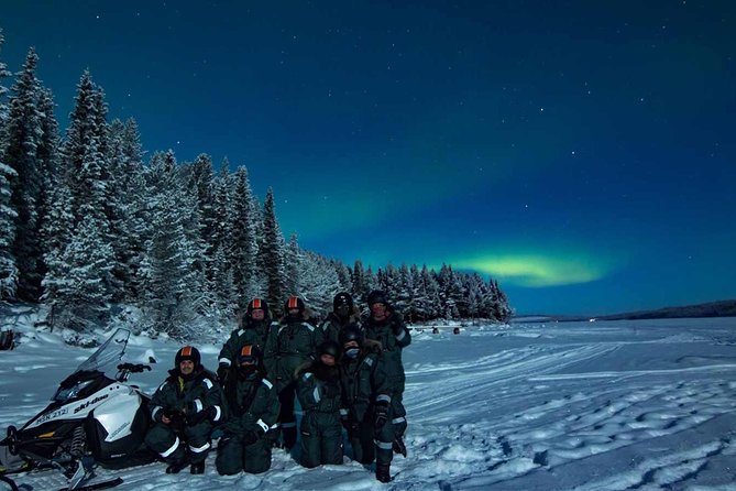 Snowmobile Aurora Expedition with dinner - Riding through forest, frozen lakes, and the Torne River