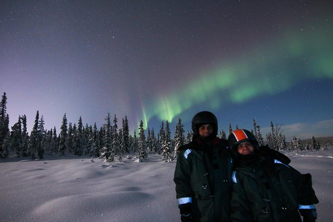 Snowmobile Aurora Expedition with dinner - Dinner in a forest hut: reindeer souvas and cloudberry dessert