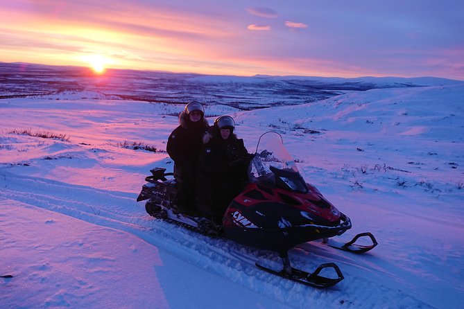 Snowmobile Safari to Lapland viewpoint - Your Comfort Setup: Clothing, Shared Snowmobiles, and a 9:00 Start
