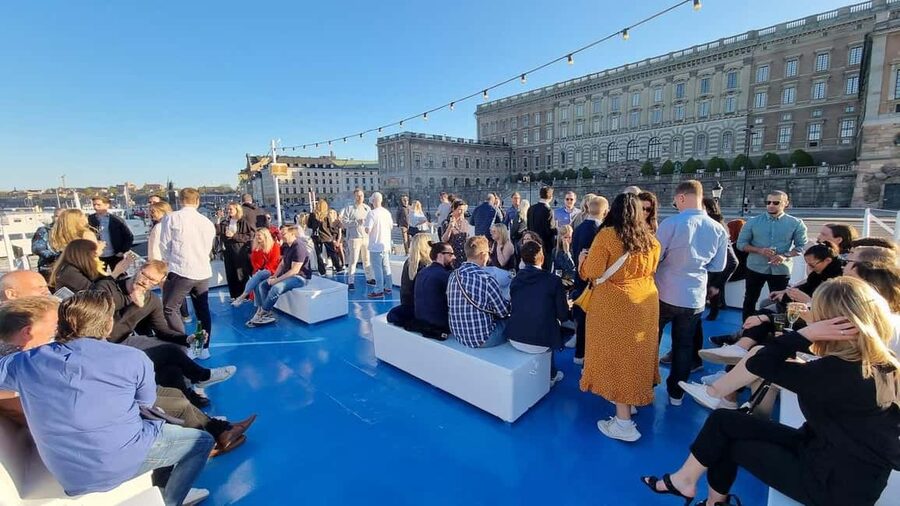 Stockholm All-You-Can-Eat Shrimp or Tacos Cruise & Livemusic - The Björnholmen bridge stop in summer: foredeck music, views, and a rare chance to stand out on the water