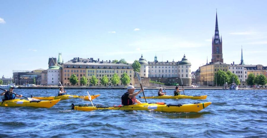 Stockholm: Guided Kayak City Tour & Optional Midsummer Meal - Kayak Setup and Safety: Close to Land, Rudders, and Real Wind