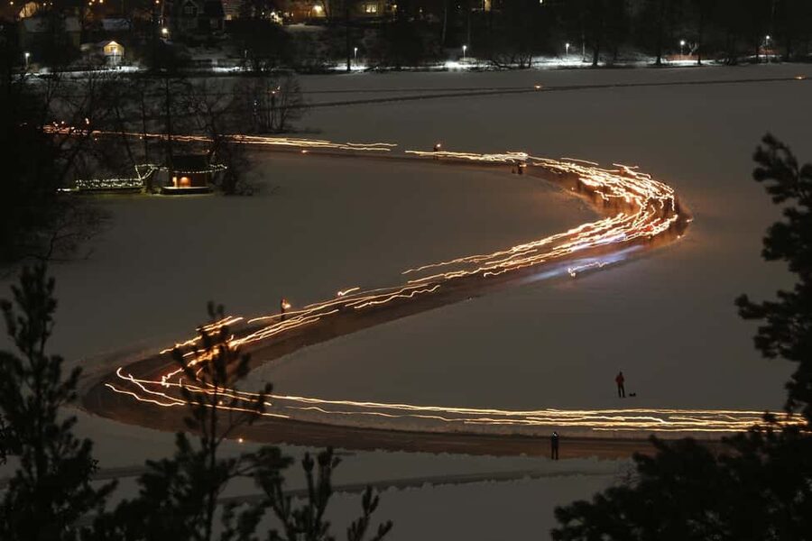 Stockholm: Ice Skating with fire & chance of Northern Lights - Torchlight skating on a real Stockholm winter night