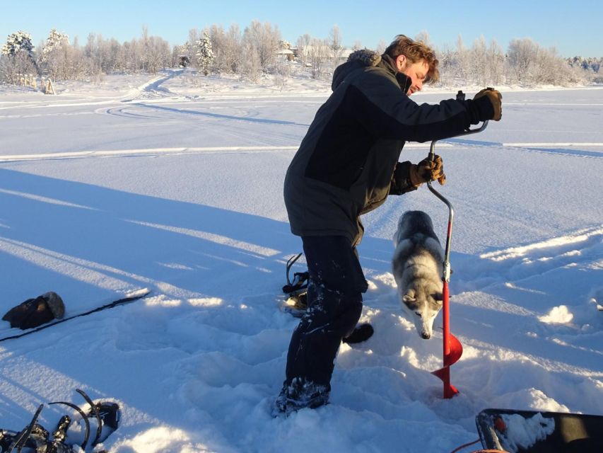 Wilderness Tour with Snowmobile & Ice Fishing - Trying ice fishing for arctic char under the ice